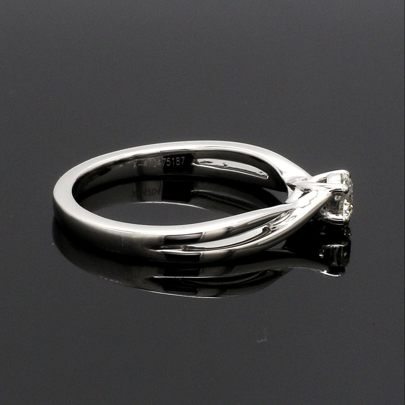 50-Pointer 4 Prong Platinum Solitaire Ring with a Twist JL PT 676-B