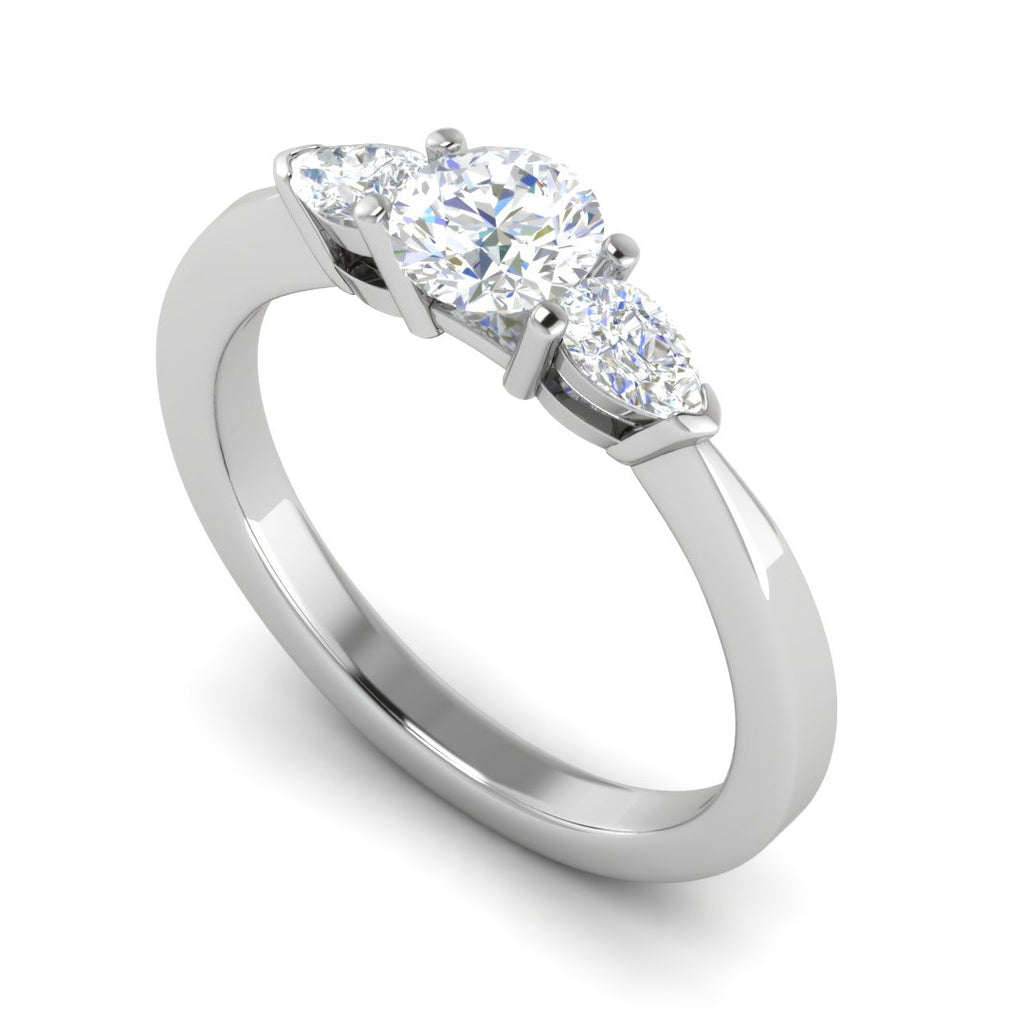 0.70 cts Solitaire with Pear Cut Diamond Accents Platinum Ring JL PT R3 RD 100   Jewelove.US